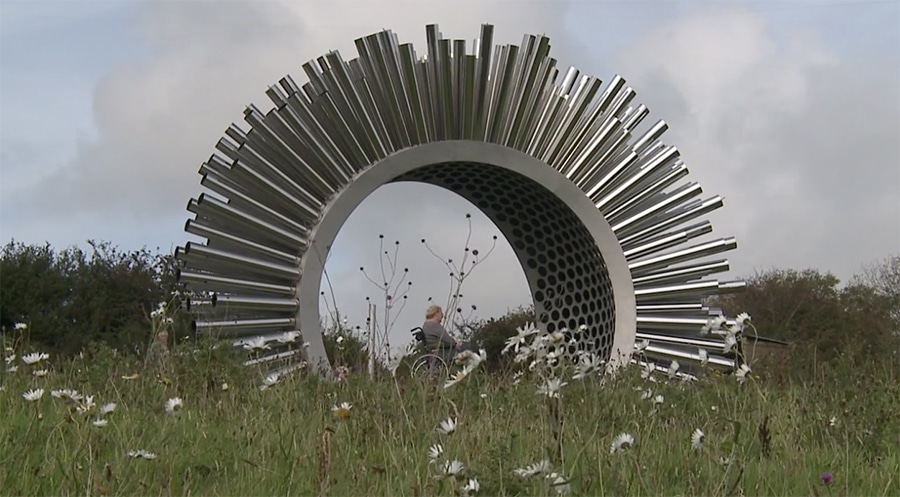 aeolus wind sculpture in a field