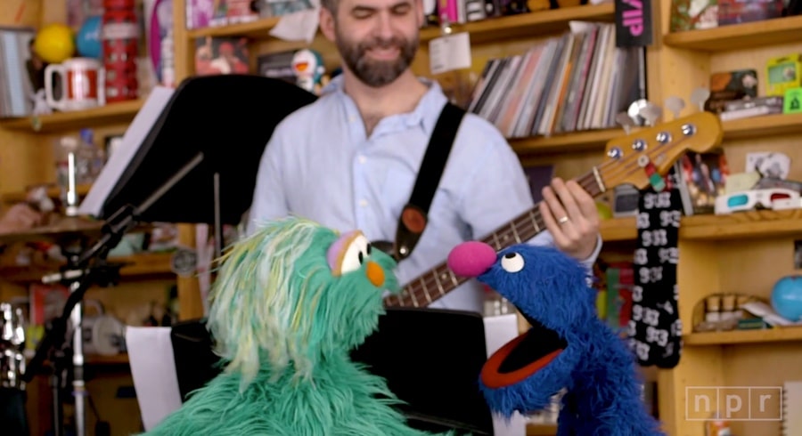 tiny desk with muppets Rosita and Grover