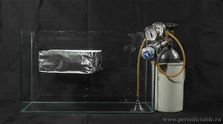 Aluminum foil floating on Sulfur Hexafluoride gas