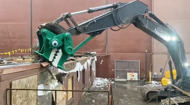 demolition dinosaur with googly eyes