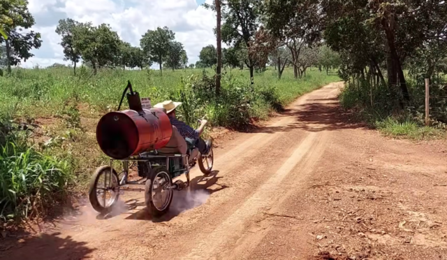 traveling on a steam-powered tricycle
