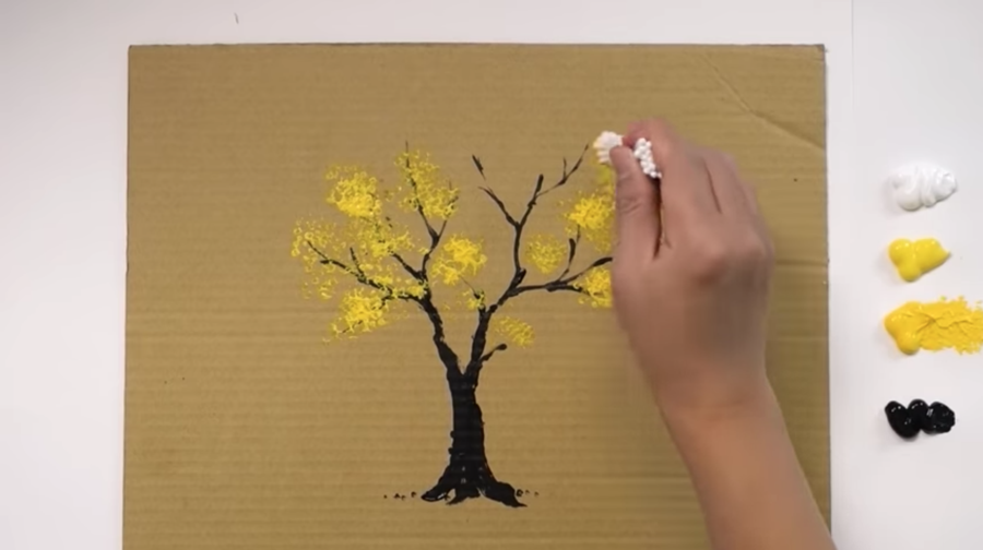 yellow tree on cardboard